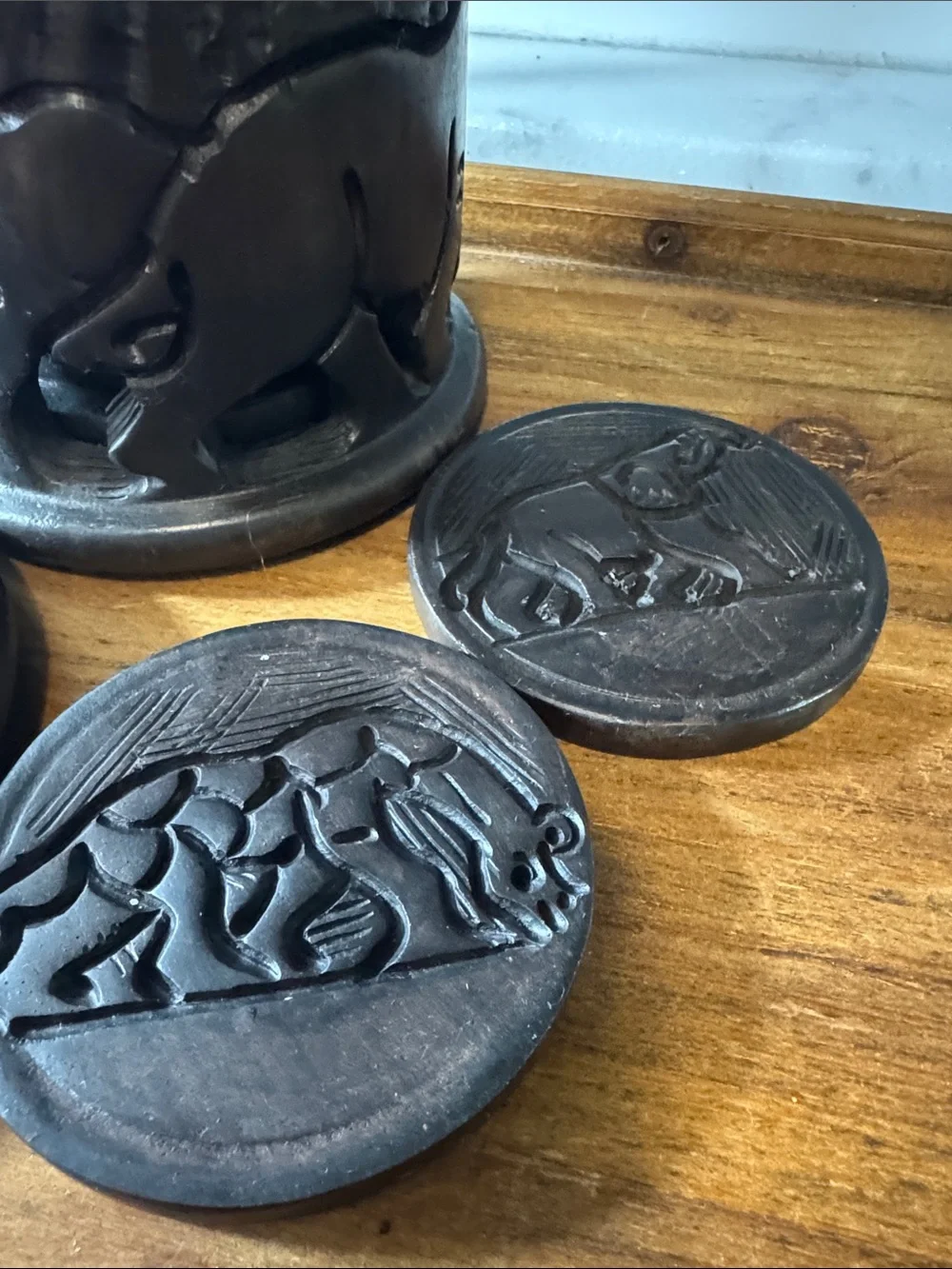 Carved Ebony Wooden Coasters with Intricate Safari Motifs